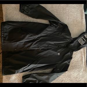 Obey women’s windbreaker with hood. **Missing bottom snap/buttton.